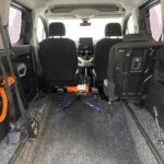 Citroen Berlingo WAV wheelchair accessible vehicle for sale at Michael Harraway Cars, Weston-super-Mare, with three passenger seats, space for one wheelchair user, and a lightweight rear access ramp. NK70 AUA 14