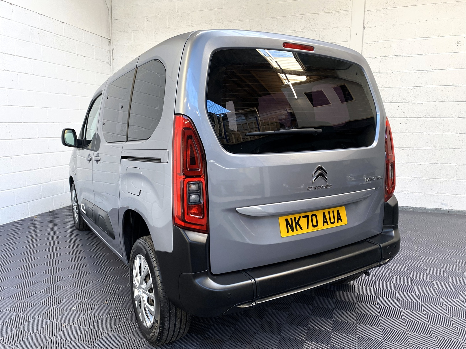 Citroen Berlingo WAV wheelchair accessible vehicle for sale at Michael Harraway Cars, Weston-super-Mare, with three passenger seats, space for one wheelchair user, and a lightweight rear access ramp. NK70 AUA 2
