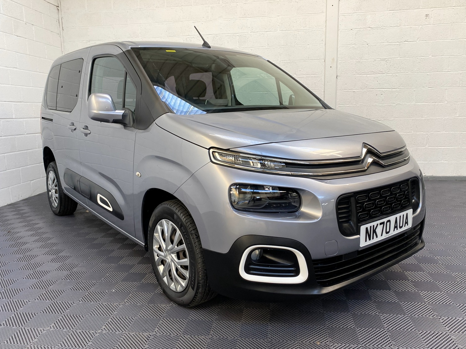 Citroen Berlingo WAV wheelchair accessible vehicle for sale at Michael Harraway Cars, Weston-super-Mare, with three passenger seats, space for one wheelchair user, and a lightweight rear access ramp. NK70 AUA 20