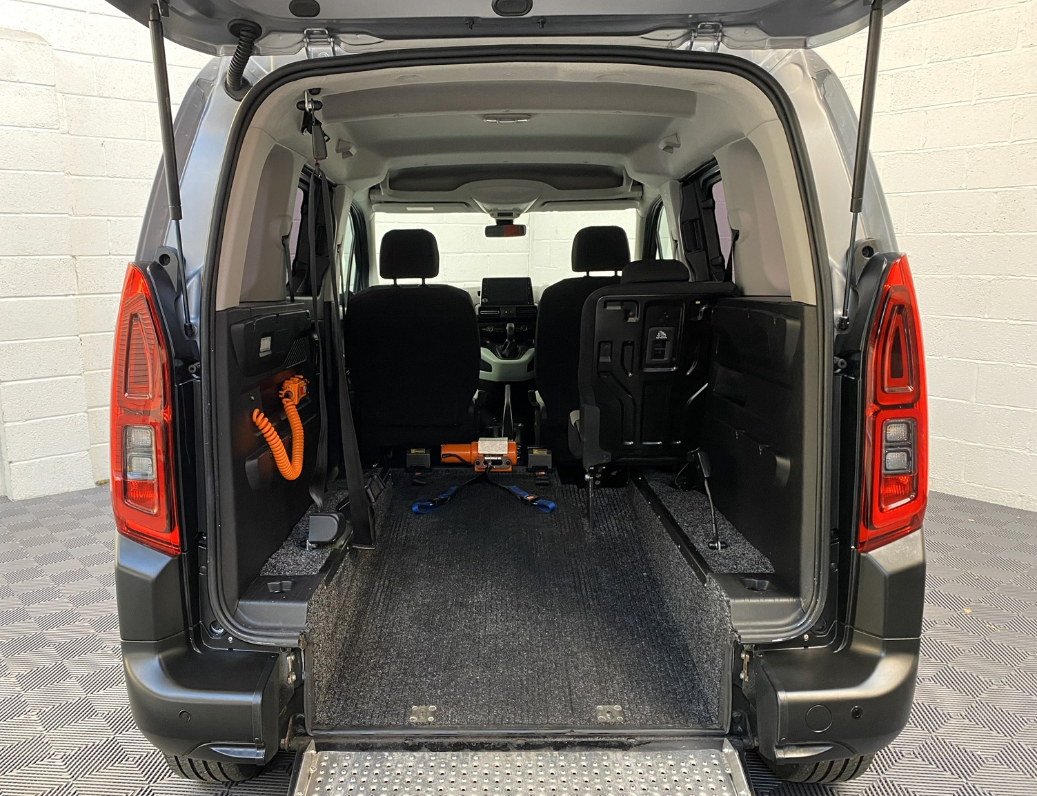 Citroen Berlingo WAV wheelchair accessible vehicle for sale at Michael Harraway Cars, Weston-super-Mare, with three passenger seats, space for one wheelchair user, and a lightweight rear access ramp. NK70 AUA 7