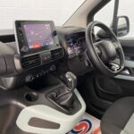 Citroen Berlingo WAV wheelchair accessible vehicle for sale at Michael Harraway Cars, Weston-super-Mare, with three passenger seats, space for one wheelchair user, and a lightweight rear access ramp. NK70 AUA 9