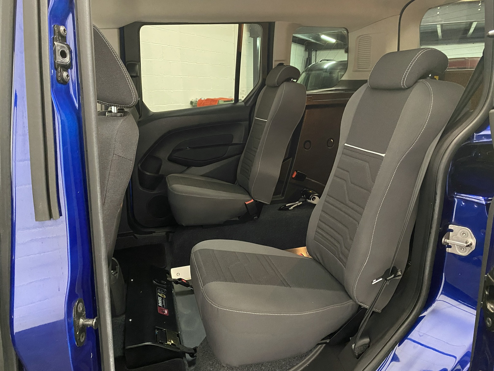 The two rear seats on a Wheelchair Accessible Vehicle Ford Tourneo Connect Titanium. Finish in Metallic Blue. For Sae at Michael Harraway Cars in Weston super Mare HG68 MMO 14