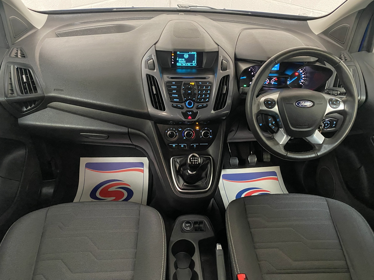 The dashboard of a Wheelchair Accessible Vehicle Ford Tourneo Connect Titanium. Finish in Metallic Blue. For Sae at Michael Harraway Cars in Weston super Mare HG68 MMO 15