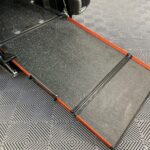 Peugeot Rifter WAV wheelchair accessible vehicle for sale at Michael Harraway Cars, Weston-super-Mare, with three passenger seats, space for one wheelchair user, and a lightweight fold-flat rear access ramp. SF20 GNP 12