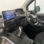 Peugeot Rifter WAV wheelchair accessible vehicle for sale at Michael Harraway Cars, Weston-super-Mare, with three passenger seats, space for one wheelchair user, and a lightweight fold-flat rear access ramp. SF20 GNP 16