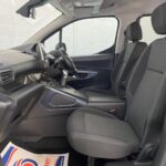 Peugeot Rifter WAV wheelchair accessible vehicle for sale at Michael Harraway Cars, Weston-super-Mare, with three passenger seats, space for one wheelchair user, and a lightweight fold-flat rear access ramp. SF20 GNP17