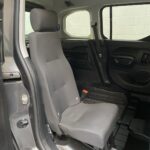 Peugeot Rifter WAV wheelchair accessible vehicle for sale at Michael Harraway Cars, Weston-super-Mare, with three passenger seats, space for one wheelchair user, and a lightweight fold-flat rear access ramp. SF20 GNP 23