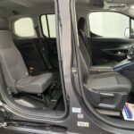 Peugeot Rifter WAV wheelchair accessible vehicle for sale at Michael Harraway Cars, Weston-super-Mare, with three passenger seats, space for one wheelchair user, and a lightweight fold-flat rear access ramp. SF20 GNP 24