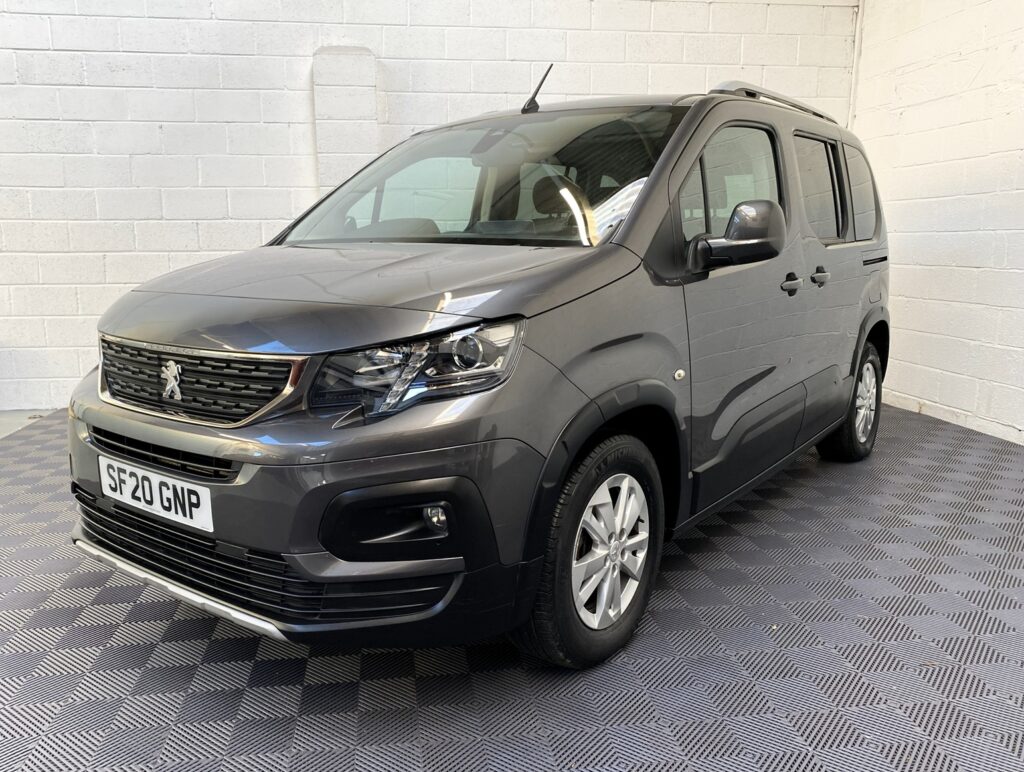 Peugeot Rifter WAV wheelchair accessible vehicle for sale at Michael Harraway Cars, Weston-super-Mare, with three passenger seats, space for one wheelchair user, and a lightweight fold-flat rear access ramp. SF20 GNP 4