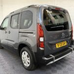 Peugeot Rifter WAV wheelchair accessible vehicle for sale at Michael Harraway Cars, Weston-super-Mare, with three passenger seats, space for one wheelchair user, and a lightweight fold-flat rear access ramp. SF20 GNP 5