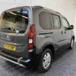 Peugeot Rifter WAV wheelchair accessible vehicle for sale at Michael Harraway Cars, Weston-super-Mare, with three passenger seats, space for one wheelchair user, and a lightweight fold-flat rear access ramp. SF20 GNP 8
