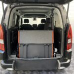 Peugeot Rifter WAV wheelchair accessible vehicle for sale at Michael Harraway Cars, Weston-super-Mare, with three passenger seats, space for one wheelchair user, and a lightweight fold-flat rear access ramp. SF20 GNP 9