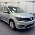 A silver Volkswagen Caddy Life wheelchair accessible vehicle WAV that is for sale at Michael Harraway Cars in Weston super Mare. HJ20 AXZ 1