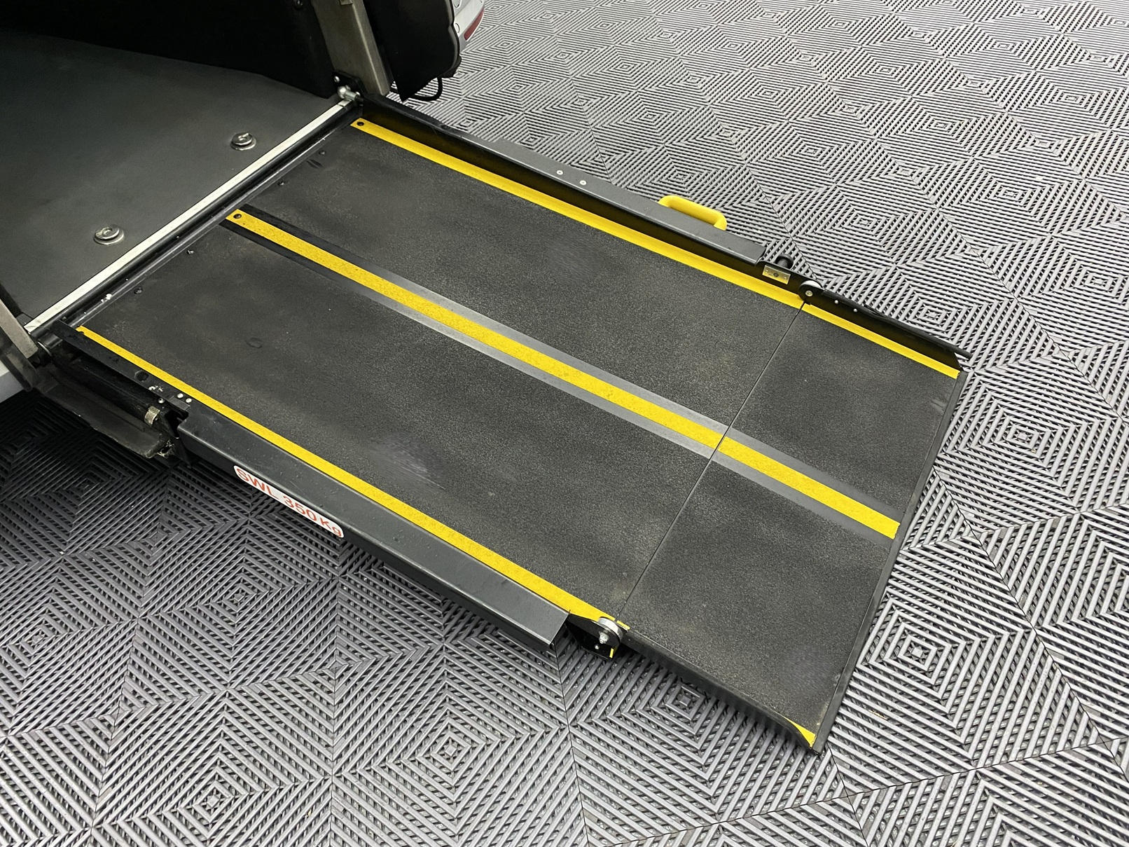 A silver Volkswagen Caddy Life wheelchair accessible vehicle WAV that is for sale at Michael Harraway Cars in Weston super Mare. HJ20 AXZ 10