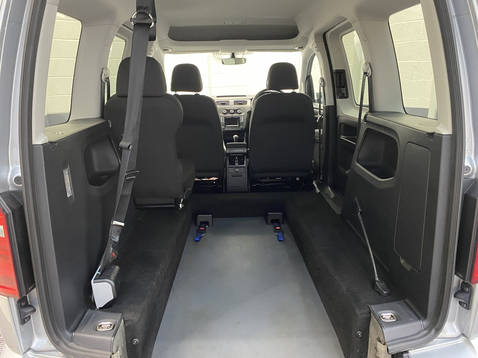 A silver Volkswagen Caddy Life wheelchair accessible vehicle WAV that is for sale at Michael Harraway Cars in Weston super Mare. HJ20 AXZ 13