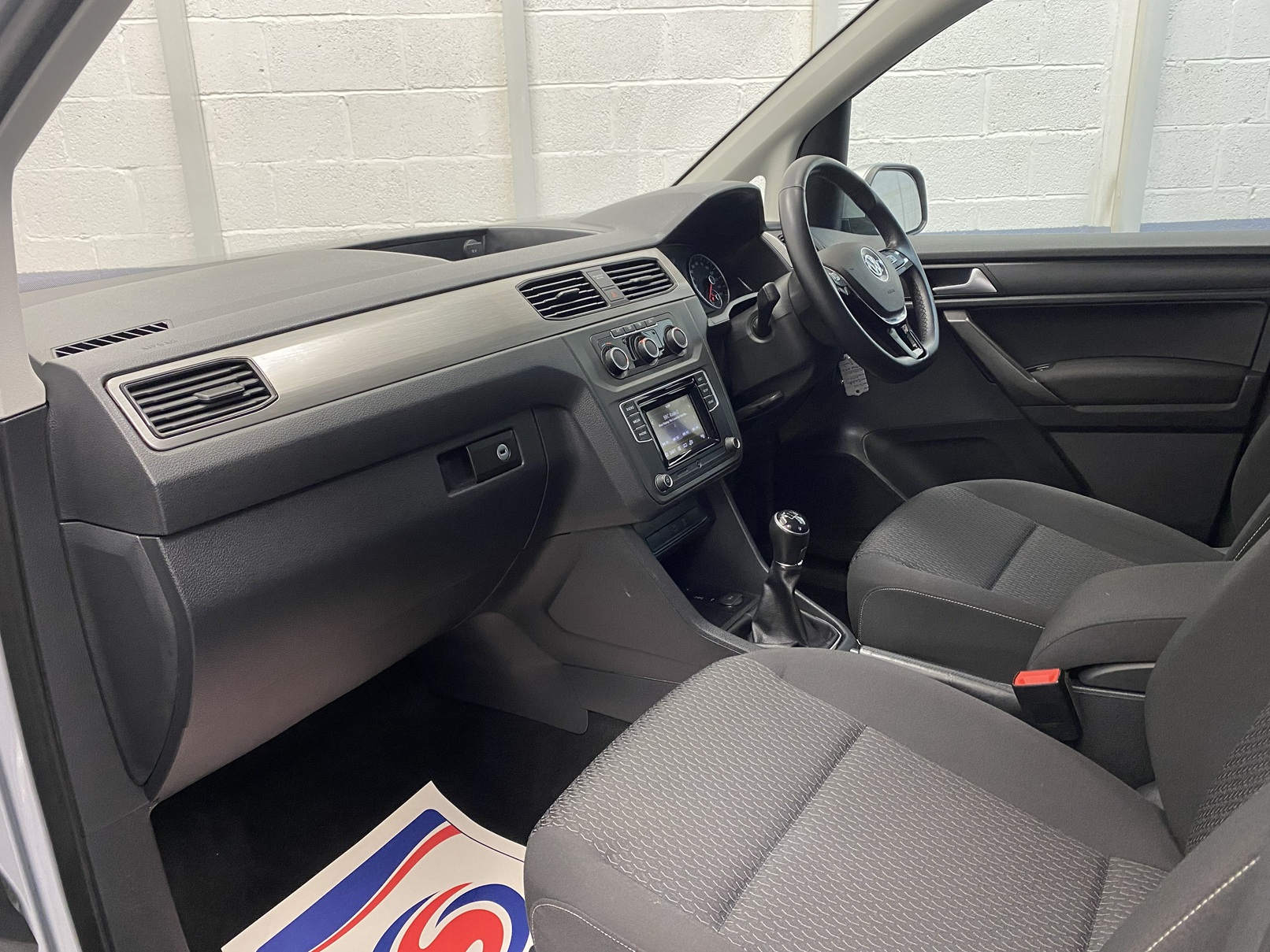 A silver Volkswagen Caddy Life wheelchair accessible vehicle WAV that is for sale at Michael Harraway Cars in Weston super Mare. HJ20 AXZ 15