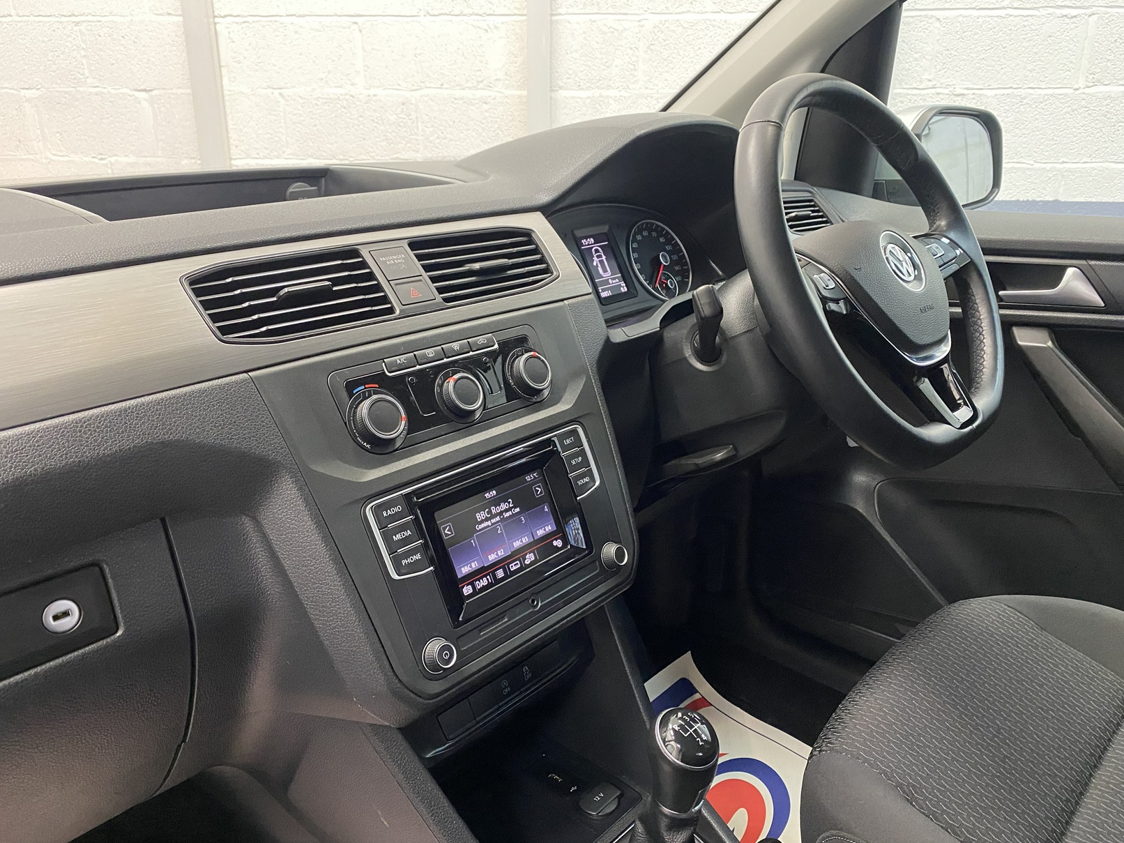 A silver Volkswagen Caddy Life wheelchair accessible vehicle WAV that is for sale at Michael Harraway Cars in Weston super Mare. HJ20 AXZ 16