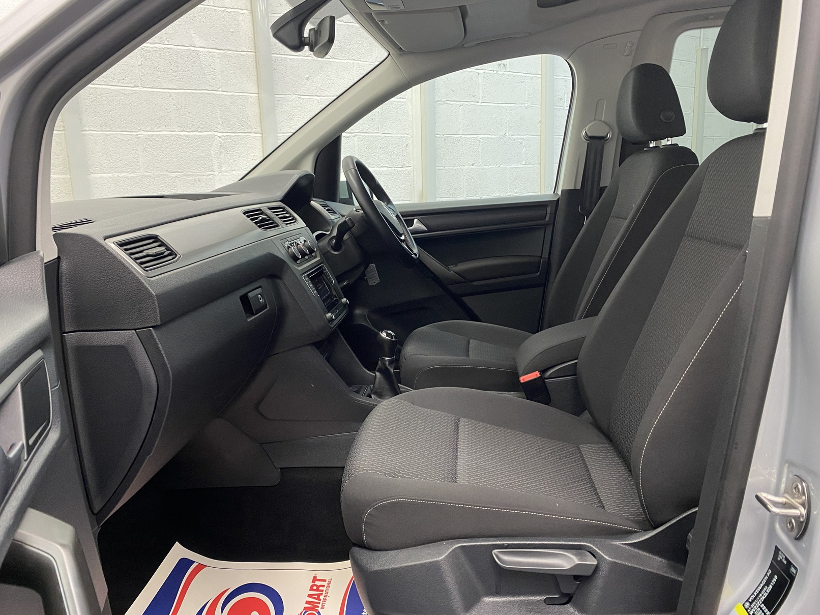 A silver Volkswagen Caddy Life wheelchair accessible vehicle WAV that is for sale at Michael Harraway Cars in Weston super Mare. HJ20 AXZ 17