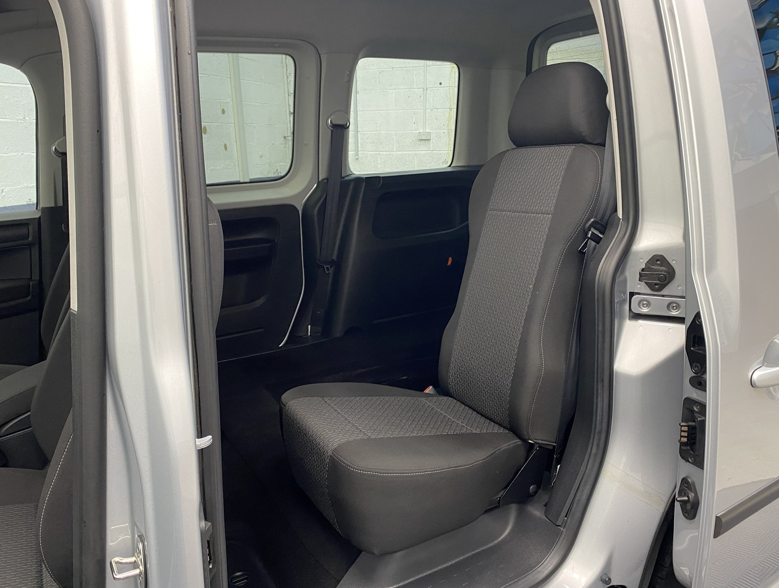 A silver Volkswagen Caddy Life wheelchair accessible vehicle WAV that is for sale at Michael Harraway Cars in Weston super Mare. HJ20 AXZ 19