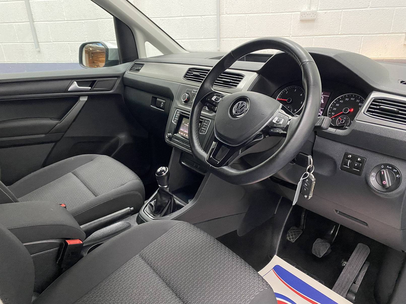 A silver Volkswagen Caddy Life wheelchair accessible vehicle WAV that is for sale at Michael Harraway Cars in Weston super Mare. HJ20 AXZ 21