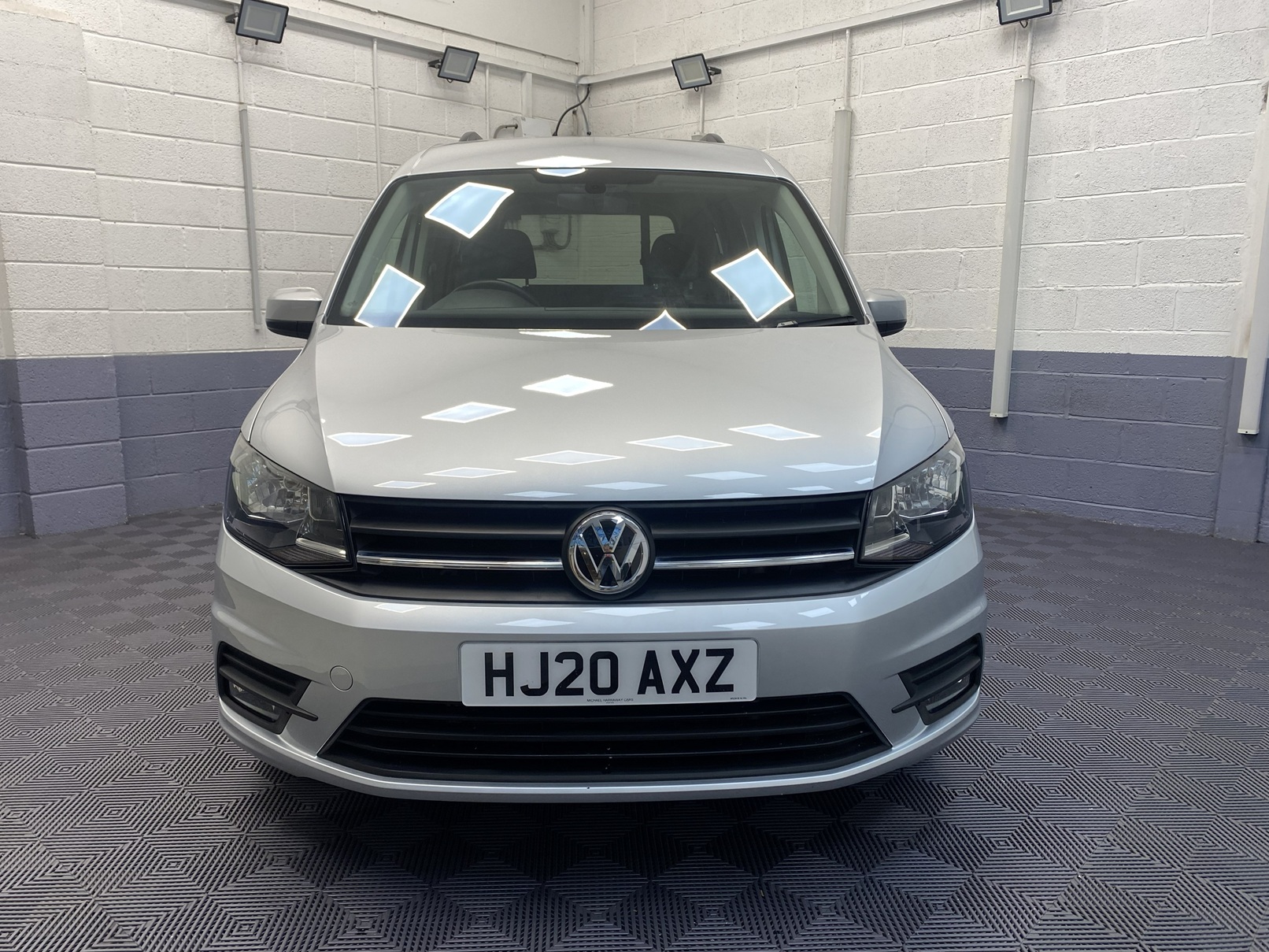 A silver Volkswagen Caddy Life wheelchair accessible vehicle WAV that is for sale at Michael Harraway Cars in Weston super Mare. HJ20 AXZ 3