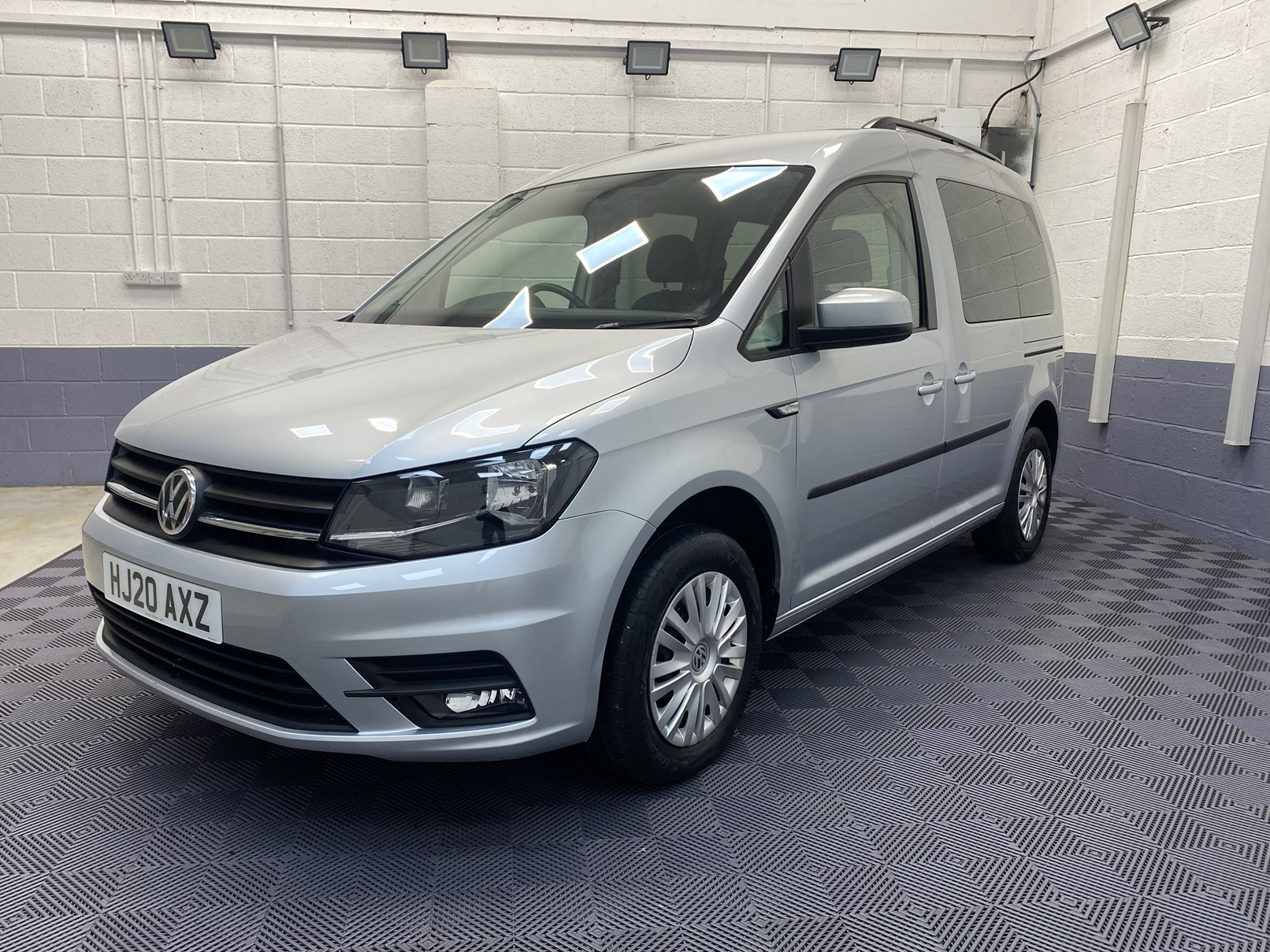 A silver Volkswagen Caddy Life wheelchair accessible vehicle WAV that is for sale at Michael Harraway Cars in Weston super Mare. HJ20 AXZ 4