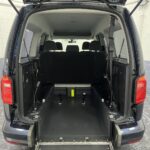 Wheelchair area in a Volkswagen Caddy Maxi WAV vehicle looking from the rear of the vehicle. YY68 LHF 1