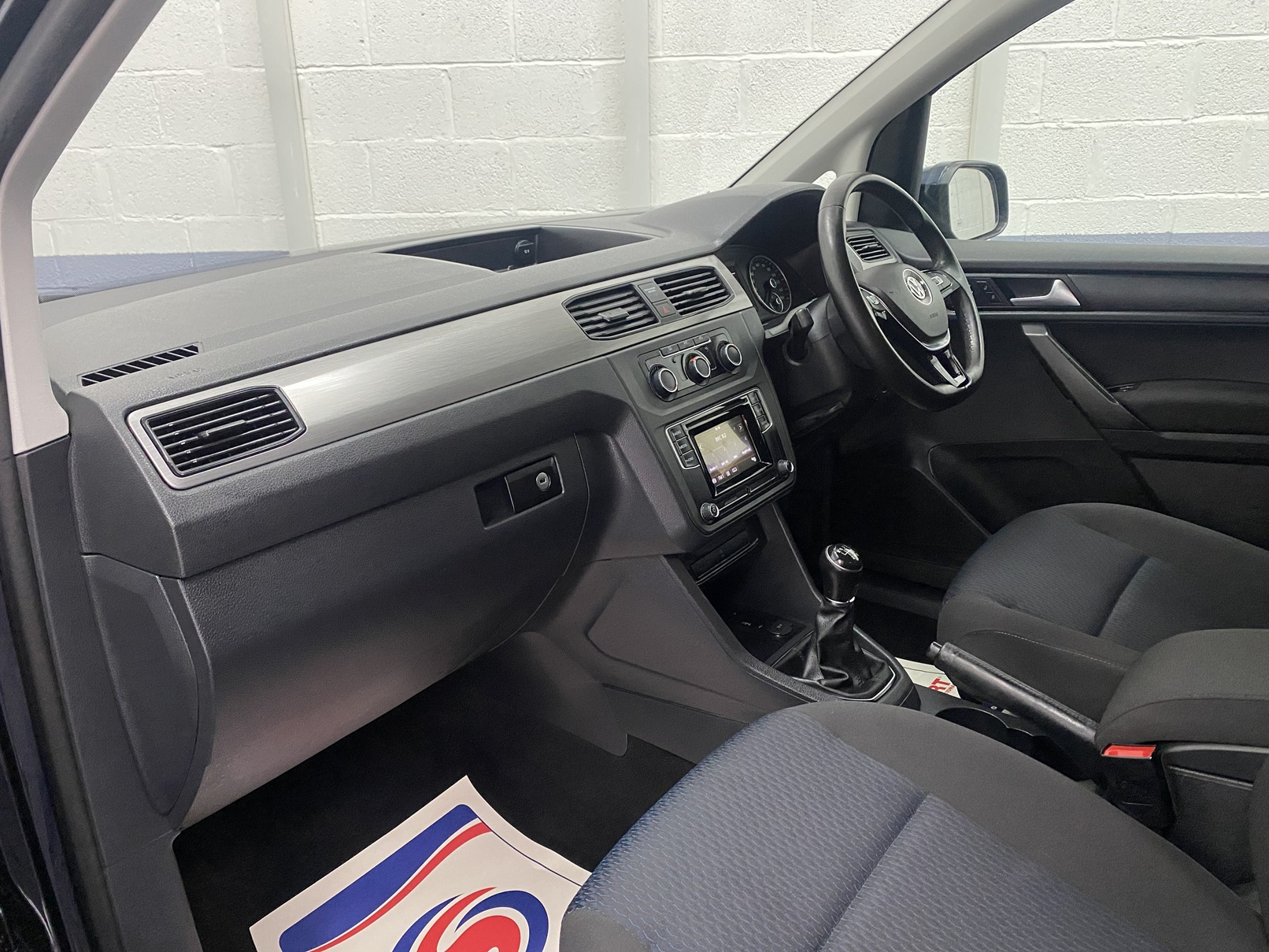 Dashboard in a Volkswagen Caddy Maxi Wheelchair accessible Vehicle YY68 LHF 1