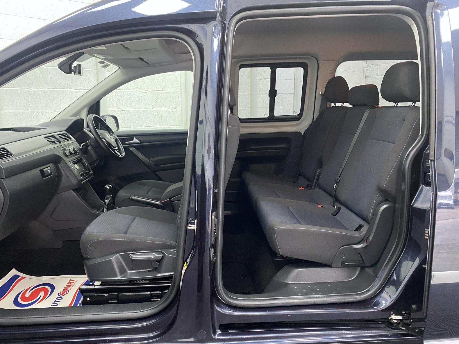 Interior of a Volkswagen Caddy Maxi Wheelchair accessible Vehicle YY68 LHF 3