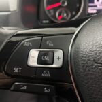 Cruise Control buttons on steering wheel in a Volkswagen Caddy Maxi Wheelchair accessible Vehicle YY68 LHF 1