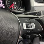 Multifunction buttons on steering wheel in a Volkswagen Caddy Maxi Wheelchair accessible Vehicle YY68 LHF 1