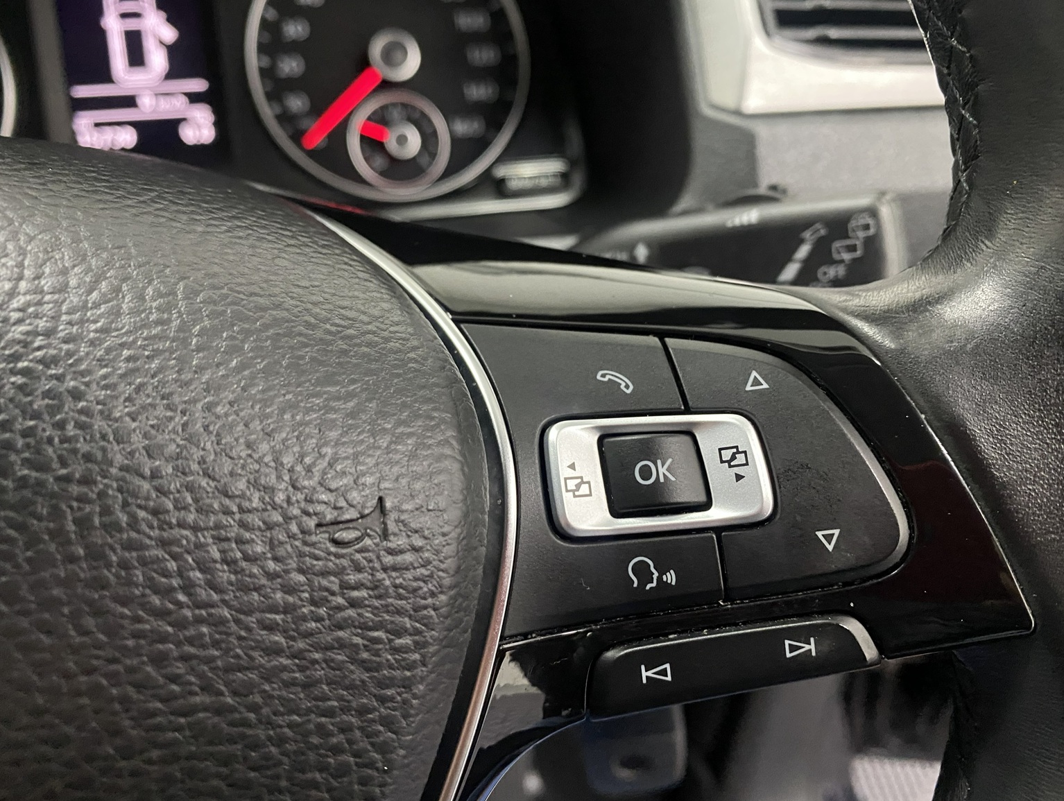 Multifunction buttons on steering wheel in a Volkswagen Caddy Maxi Wheelchair accessible Vehicle YY68 LHF 1
