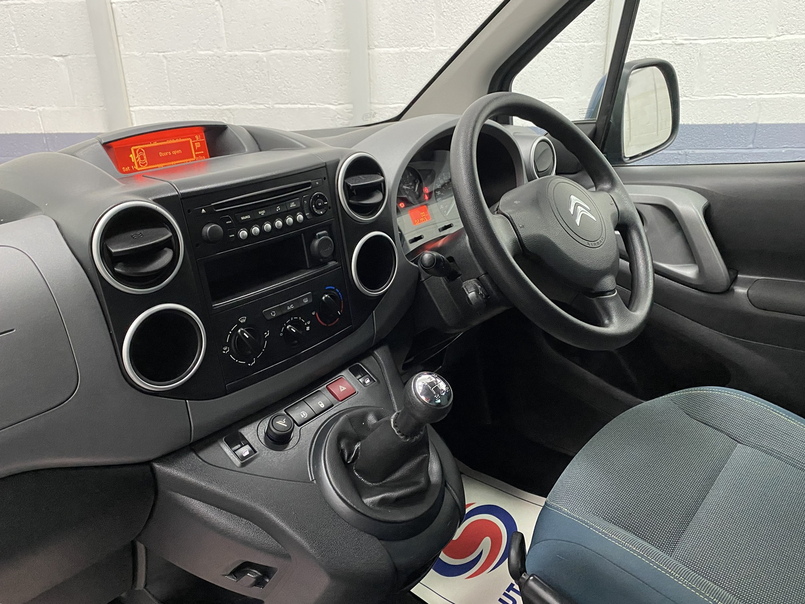 Citroen Berlingo - Close of dashboard showing driver controls. NK68 BEU