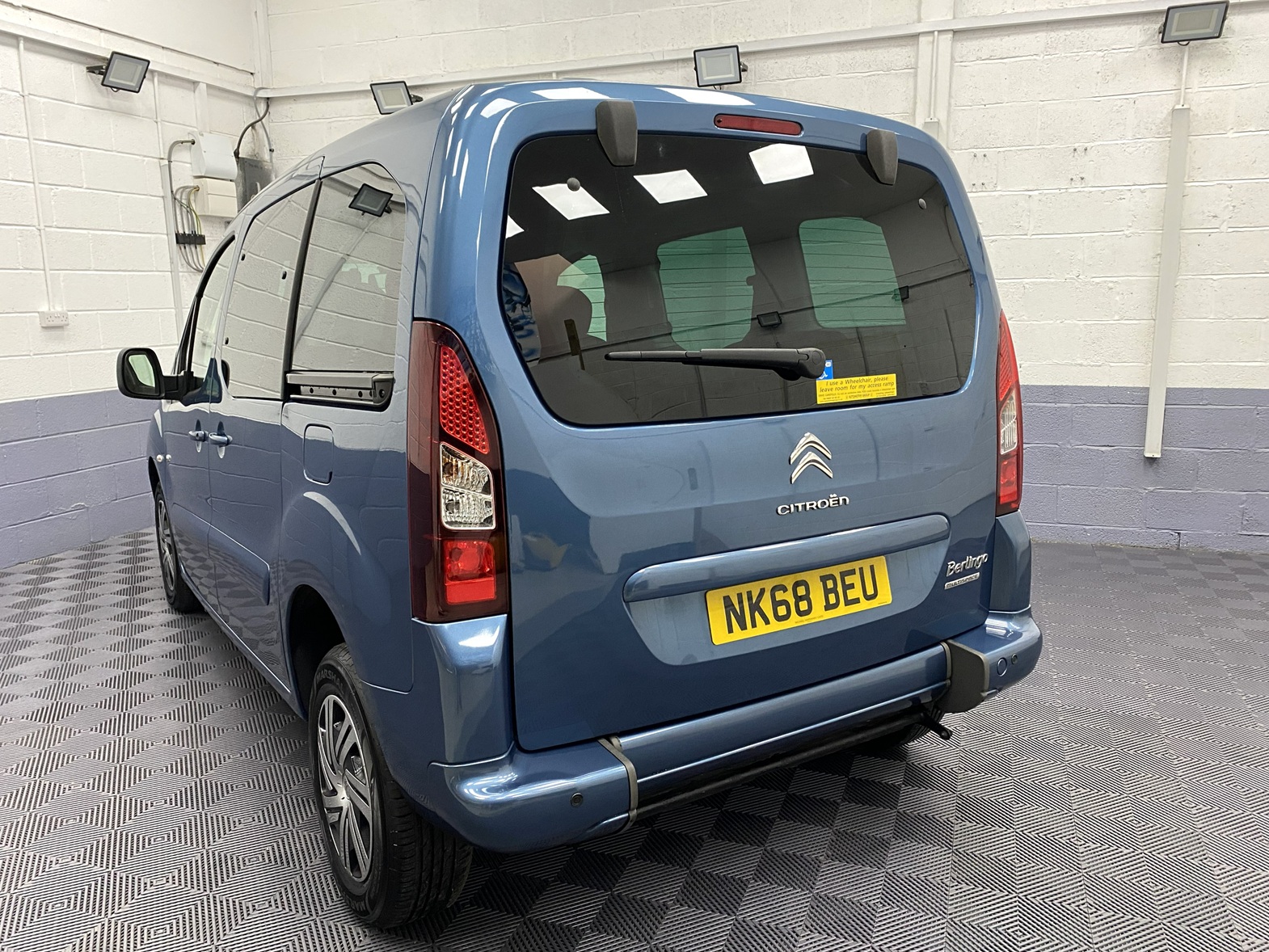 Blue Citroen Berlingo - tailgate quarter view