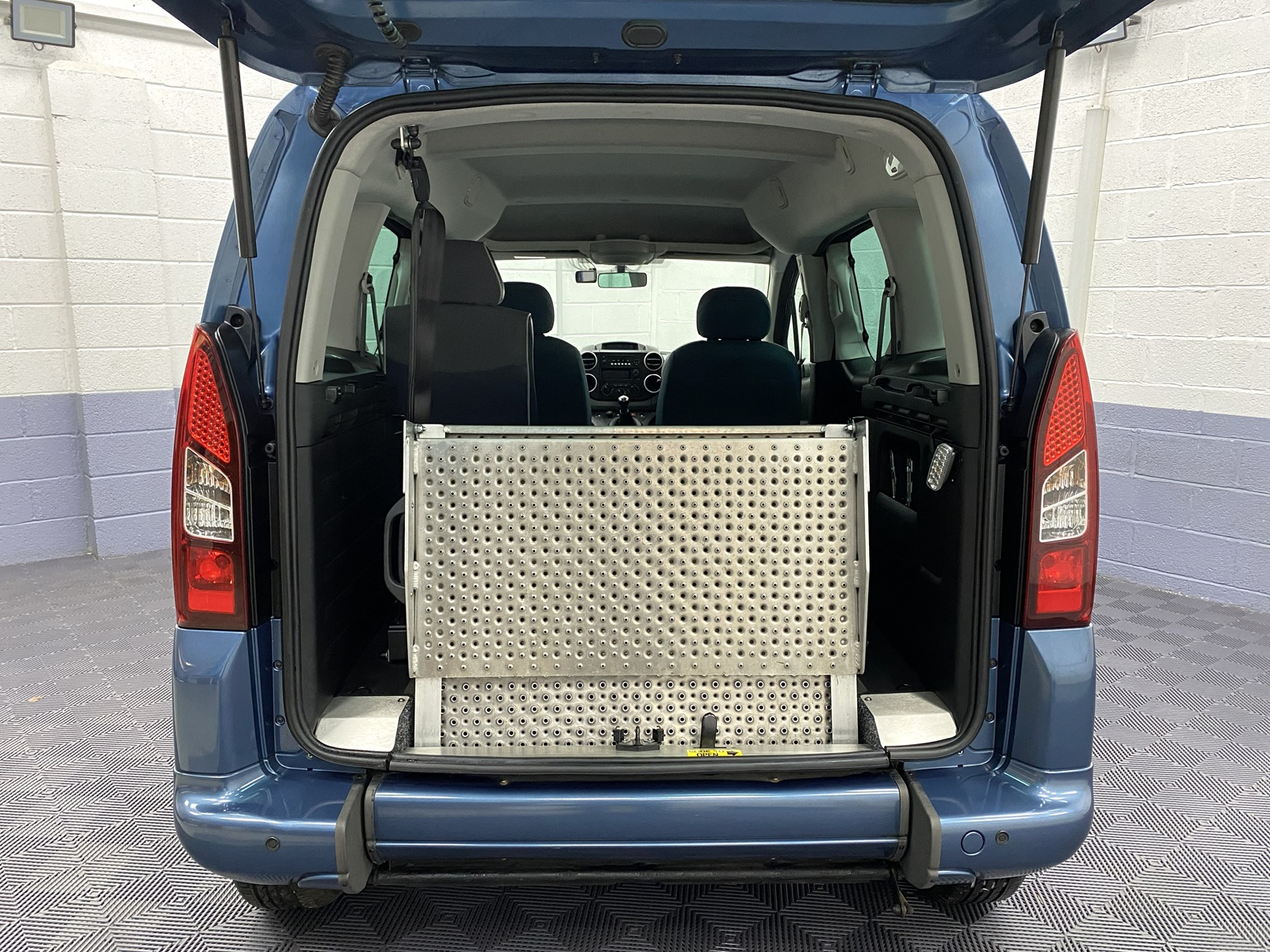 Citroen Berlingo wheelchair accessible vehicle - ramp folded up. NK68 BEU