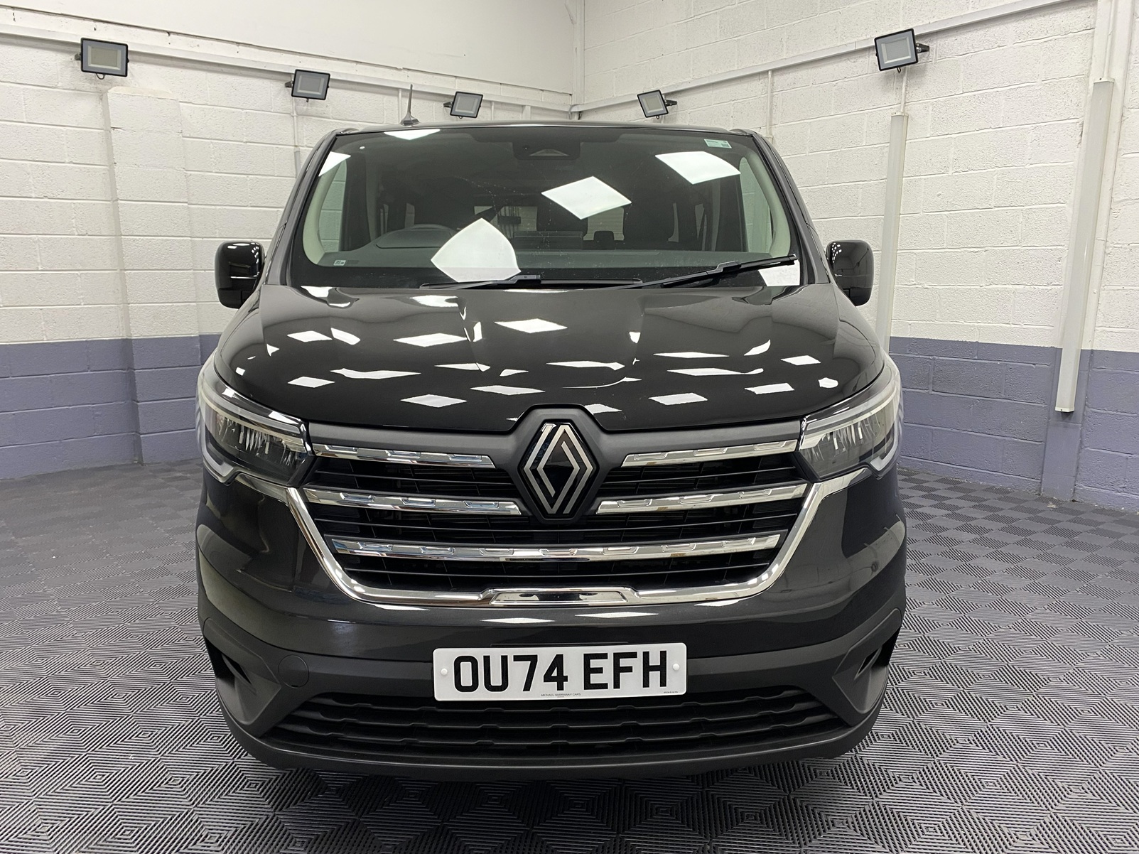 A black Renault Trafic Wheelchair Accessible Vehicle WAV that is for sale at Michael Harraway Cars in Weston super Mare. OU74 EFH 22