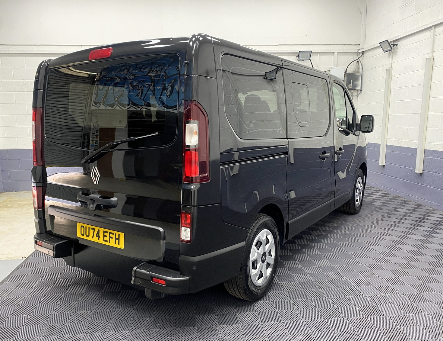 A black Renault Trafic Wheelchair Accessible Vehicle WAV that is for sale at Michael Harraway Cars in Weston super Mare. OU74 EFH 3