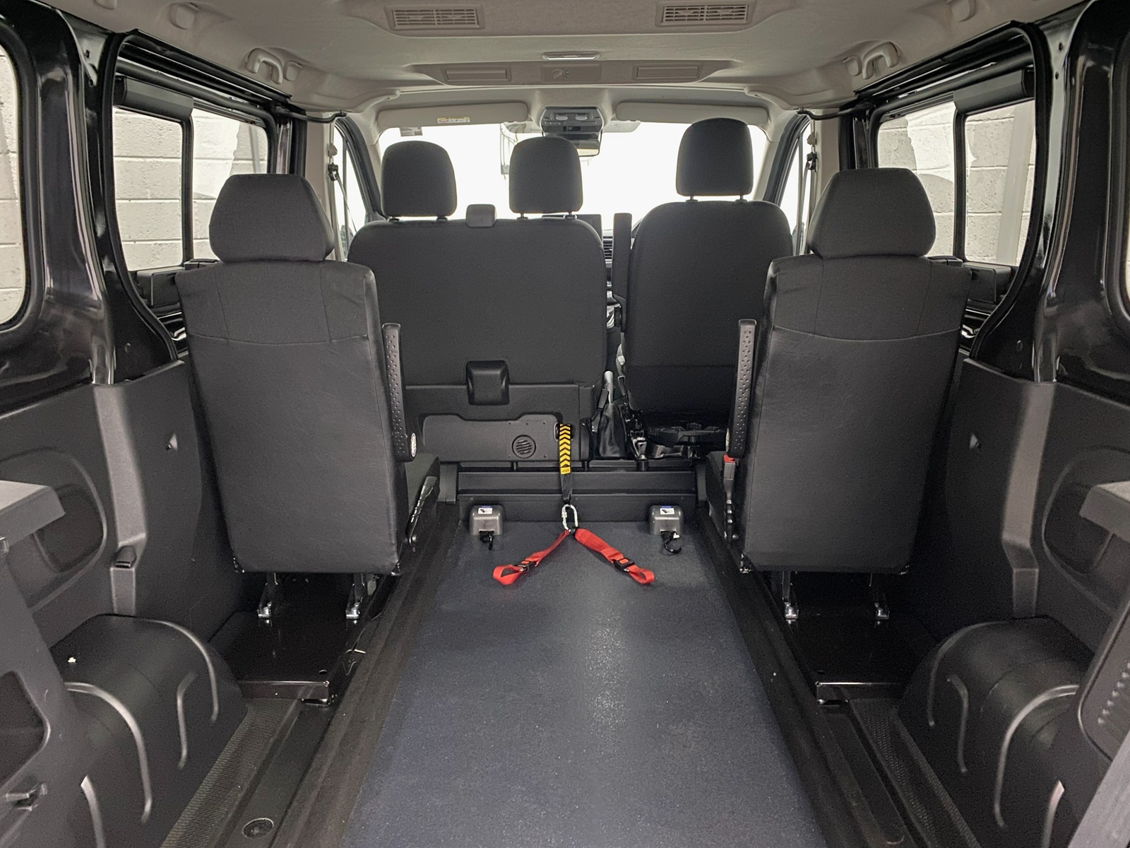 A black Renault Trafic Wheelchair Accessible Vehicle WAV that is for sale at Michael Harraway Cars in Weston super Mare. OU74 EFH 4