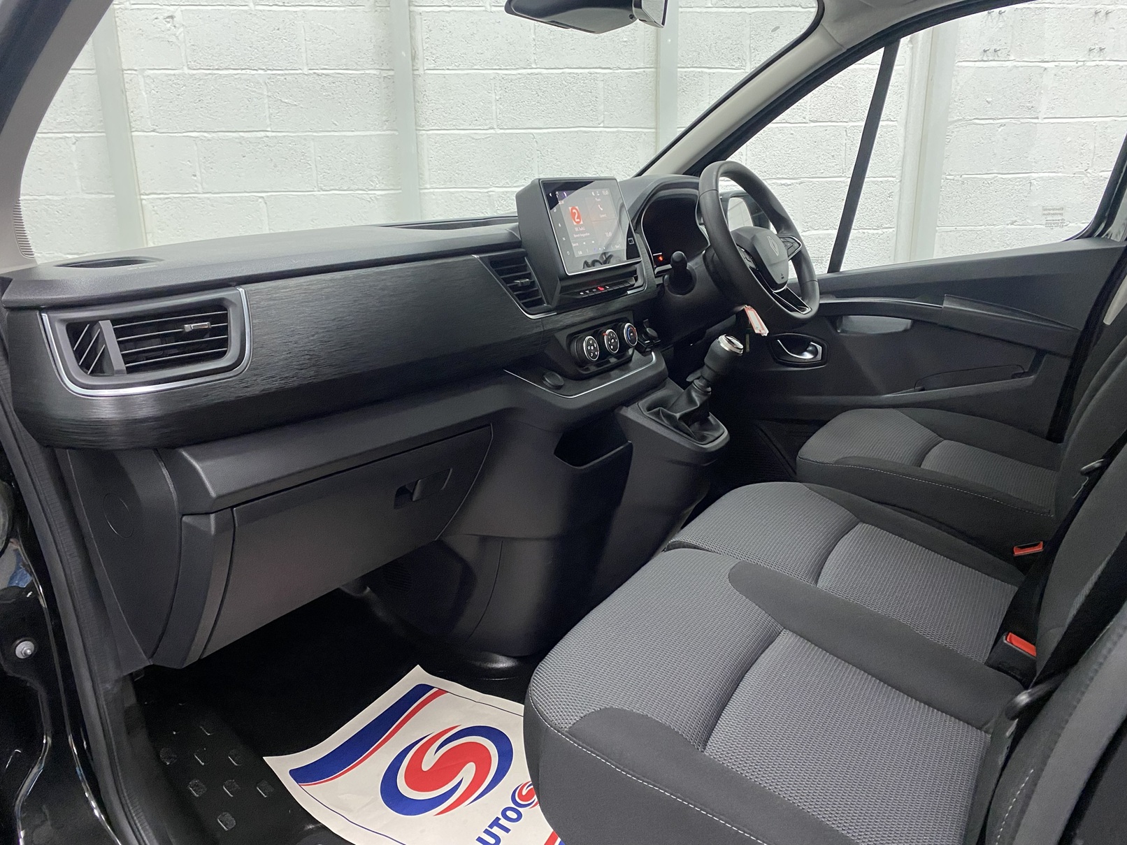 A black Renault Trafic Wheelchair Accessible Vehicle WAV that is for sale at Michael Harraway Cars in Weston super Mare. OU74 EFH 6