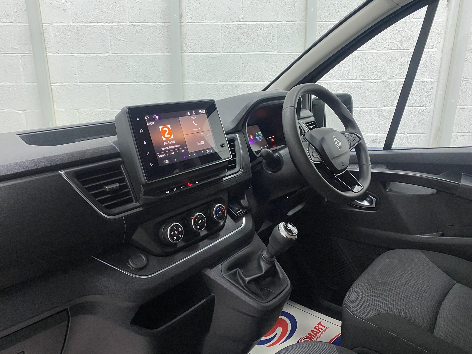 A black Renault Trafic Wheelchair Accessible Vehicle WAV that is for sale at Michael Harraway Cars in Weston super Mare. OU74 EFH 7