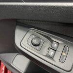 New shape Volkswagen Caddy Maxi in metallic Red that has been adapted to carry a wheelchair passenger. ND72 HOJ 19