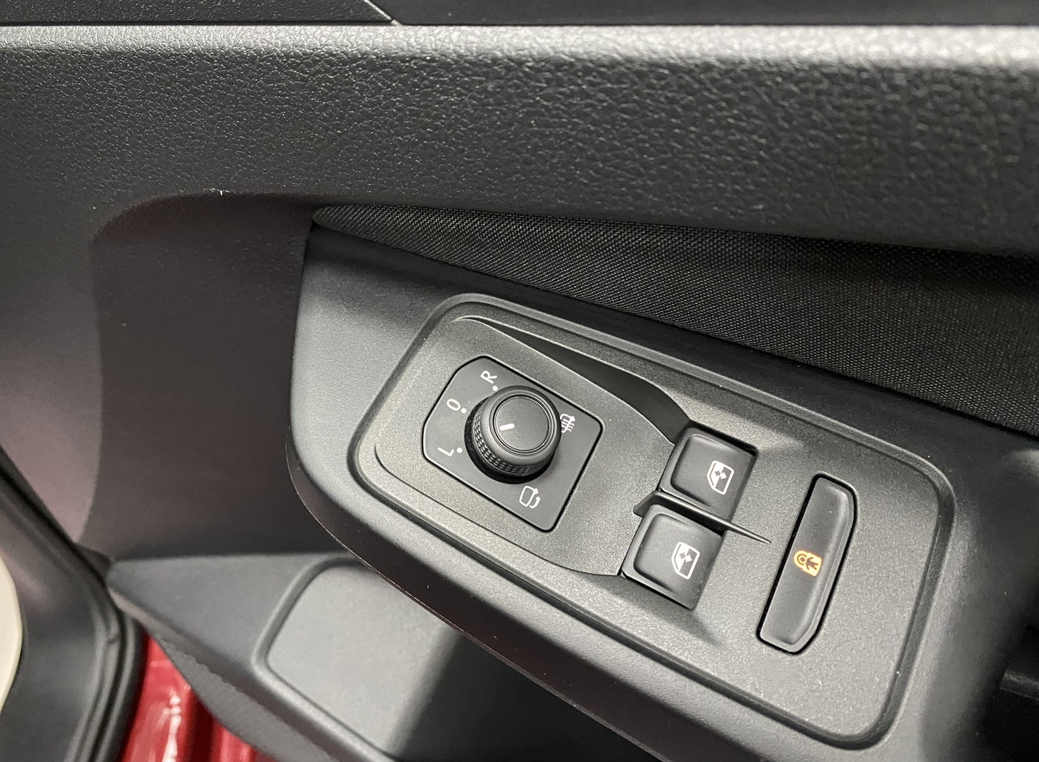 New shape Volkswagen Caddy Maxi in metallic Red that has been adapted to carry a wheelchair passenger. ND72 HOJ 19