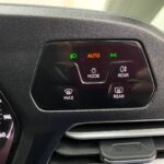 New shape Volkswagen Caddy Maxi in metallic Red that has been adapted to carry a wheelchair passenger. ND72 HOJ 20