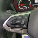 New shape Volkswagen Caddy Maxi in metallic Red that has been adapted to carry a wheelchair passenger. ND72 HOJ 21