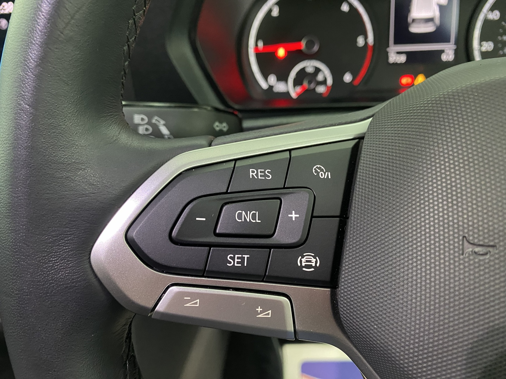 New shape Volkswagen Caddy Maxi in metallic Red that has been adapted to carry a wheelchair passenger. ND72 HOJ 21