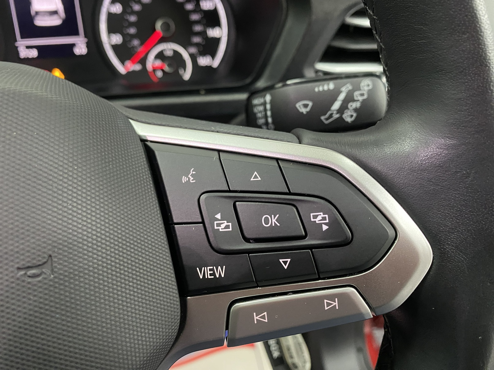 New shape Volkswagen Caddy Maxi in metallic Red that has been adapted to carry a wheelchair passenger. ND72 HOJ 22