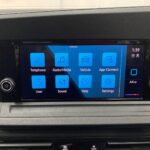 New shape Volkswagen Caddy Maxi in metallic Red that has been adapted to carry a wheelchair passenger. ND72 HOJ 23