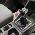 New shape Volkswagen Caddy Maxi in metallic Red that has been adapted to carry a wheelchair passenger. ND72 HOJ 24