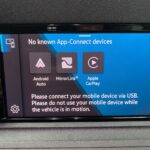 New shape Volkswagen Caddy Maxi in metallic Red that has been adapted to carry a wheelchair passenger. ND72 HOJ 25