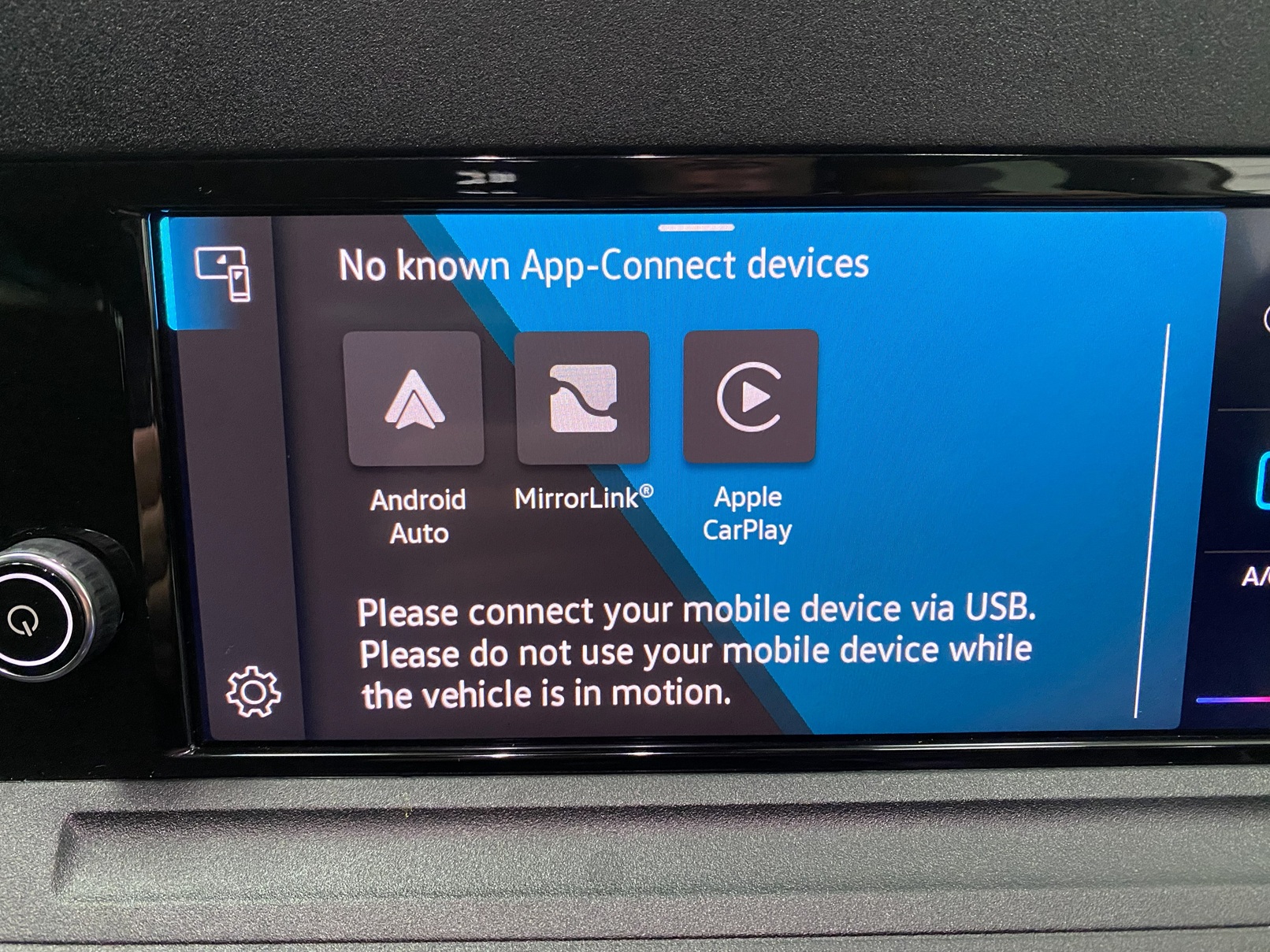 New shape Volkswagen Caddy Maxi in metallic Red that has been adapted to carry a wheelchair passenger. ND72 HOJ 25